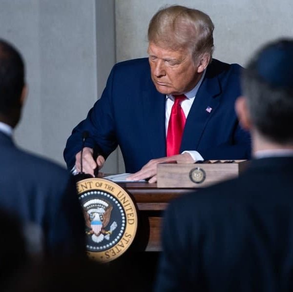 YOU'RE FIRED: President Donald Trump to 4 Biden Appointees President Trump holds a Constitution Day proclamation after speaking Thursday during the White House Conference on American History at the National Archives in Washington, D.C.