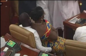 Ursula Owusu relaxing on Akandoh's laps