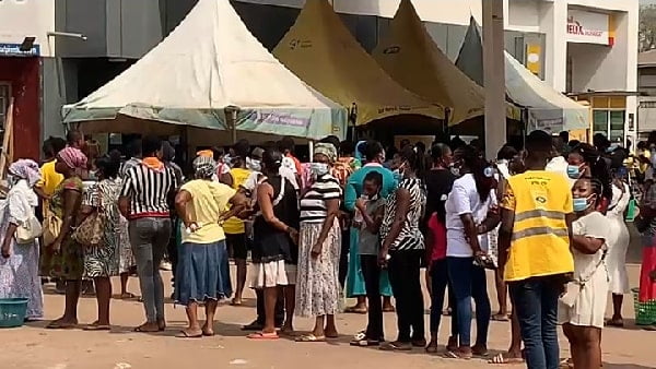 Thousands scrambling to beat SIM cards registration deadline as long queues build up for people queue to register their SIMs